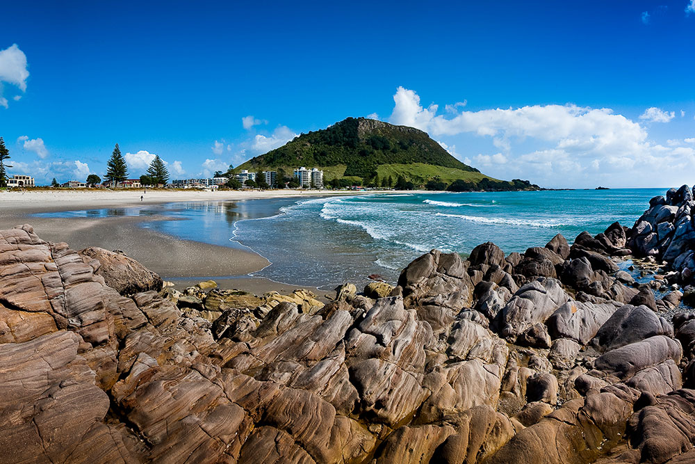 A photograph of Mt Maunganui taken from the beach